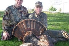 Stewart England & Don Padgett had no luck on roosting the night before, but on Saturday (4/25/09) Stewart scratched his slate call every 20 minutes or so. At 6:30 a.m. the Gobbler came in with one hen. Not one gobble! Don had to make the shot off the opposite hand. This is the first bird for Don Padgett in 9 years of turkey hunting. Some are saying "the bird of a lifetime" at 25lbs, with 11” beard, 1 ¼” left spur and 1 3/8” right spur. Congratulations Don!